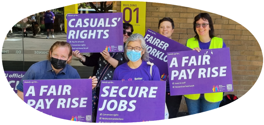 UTS NTEU members holding banners during their strike